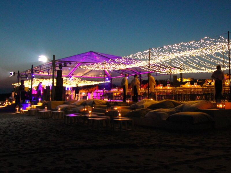 Clear top marquee tent structure and dance floor platform for 18th beach birthday in Capalbio